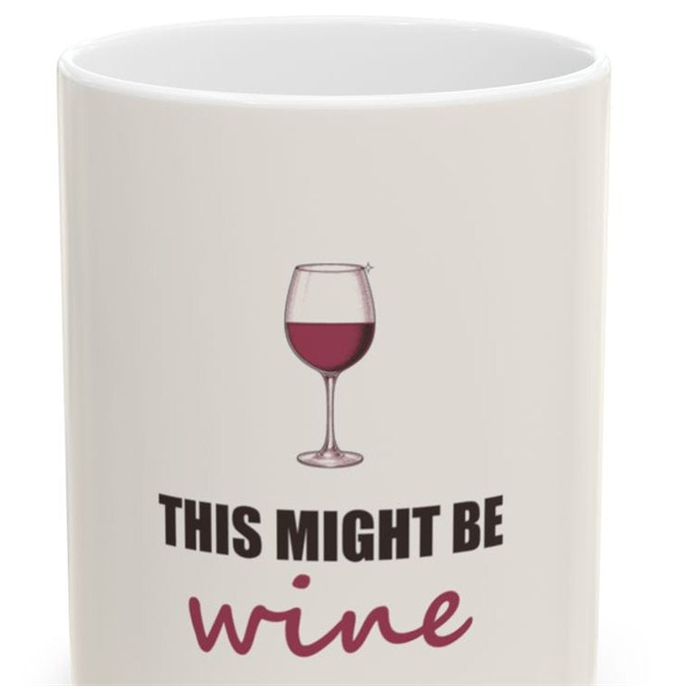 Ceramic mug printed with 'This might be wine'